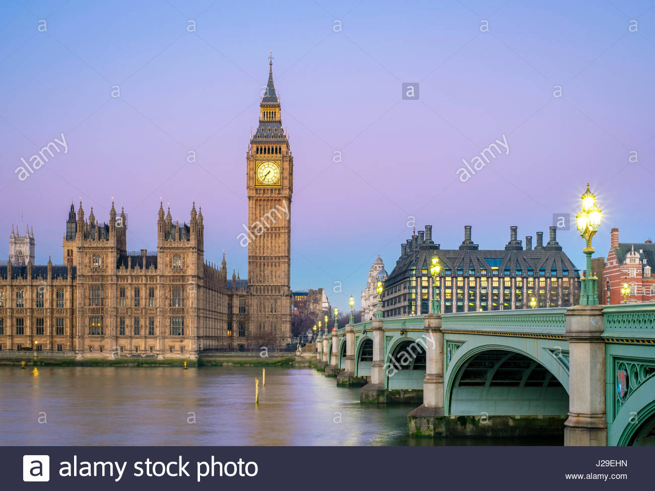 United Kingdom, England, London. Westminster Bridge, Palace of Westminster and the clock tower of Big Ben (Elizabeth Tower), at dawn. Stock Photo