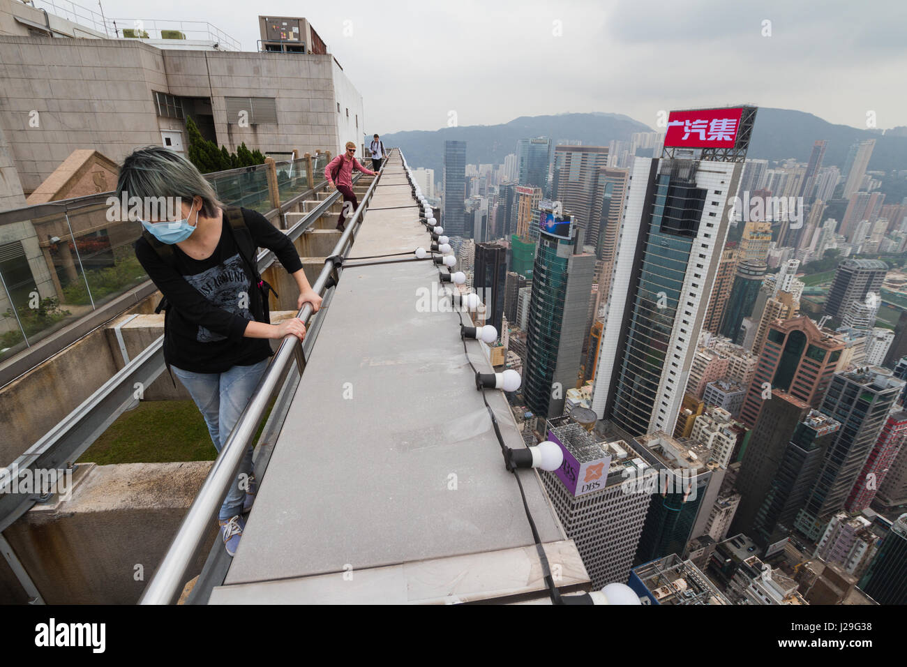 Picture of The team of rooftoppers scale the top of one highrise building. MIND ...
