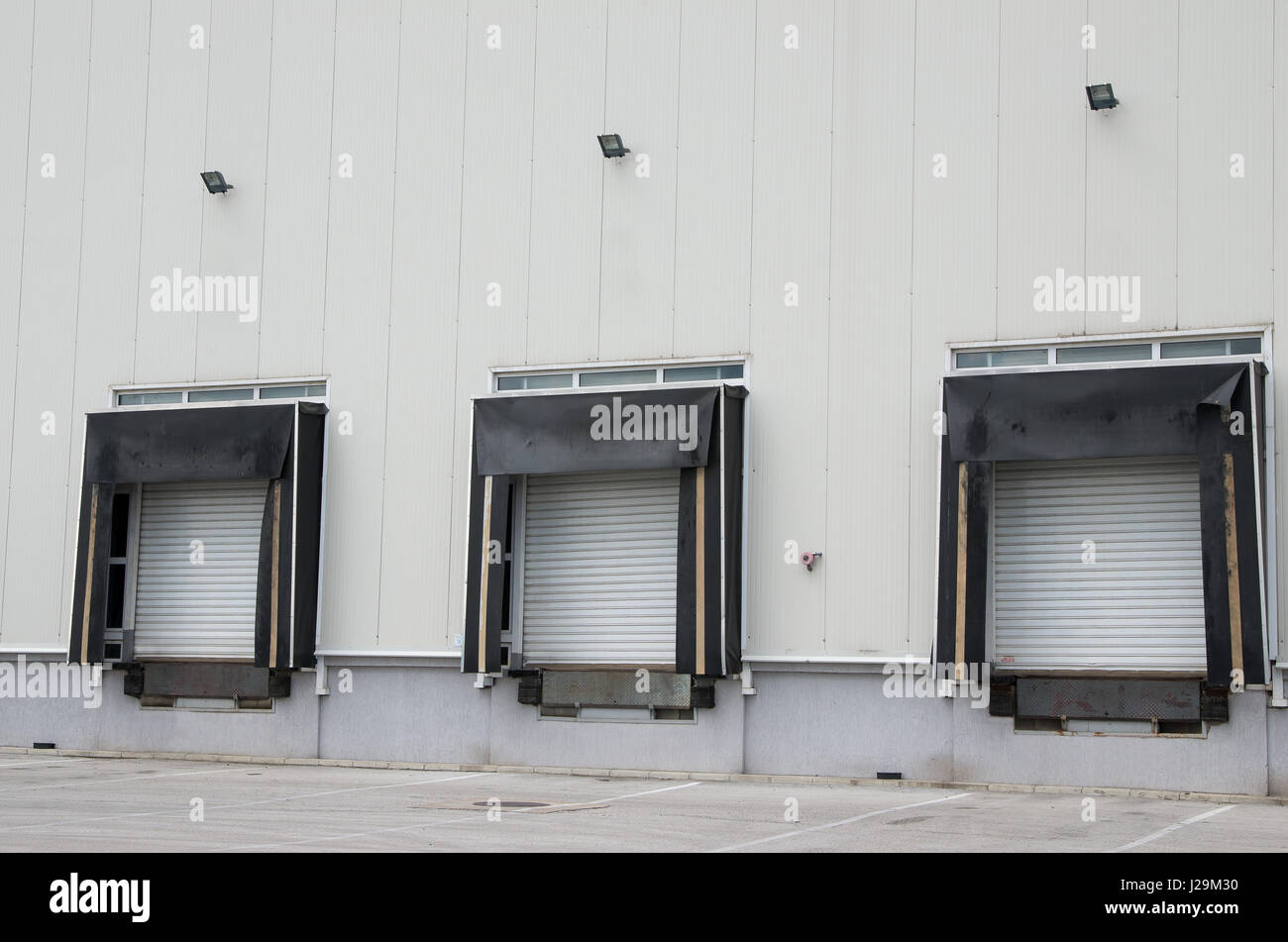 Front view of loading docks of warehouse. Loading platform Stock Photo