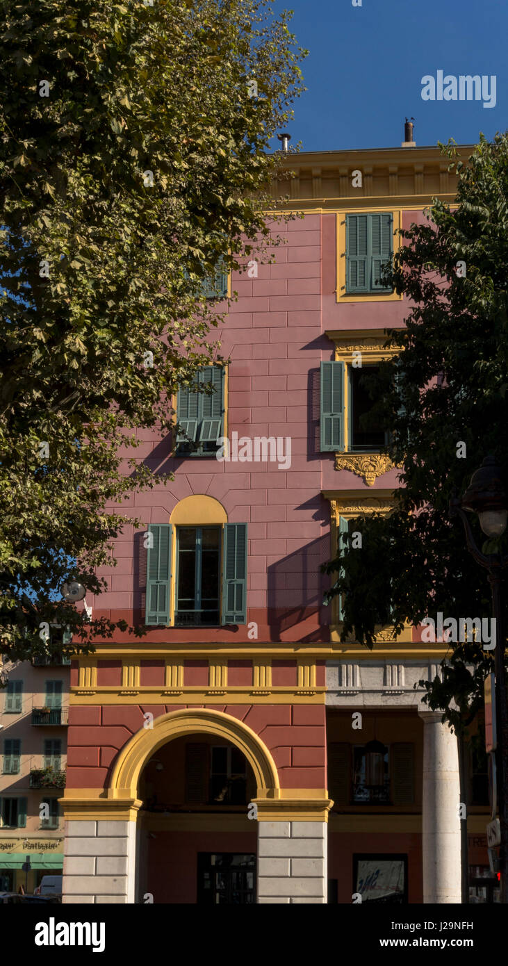 France, South-Eastern France, French Riviera, Nice, ruddle and pink facade of a building on the port Stock Photo