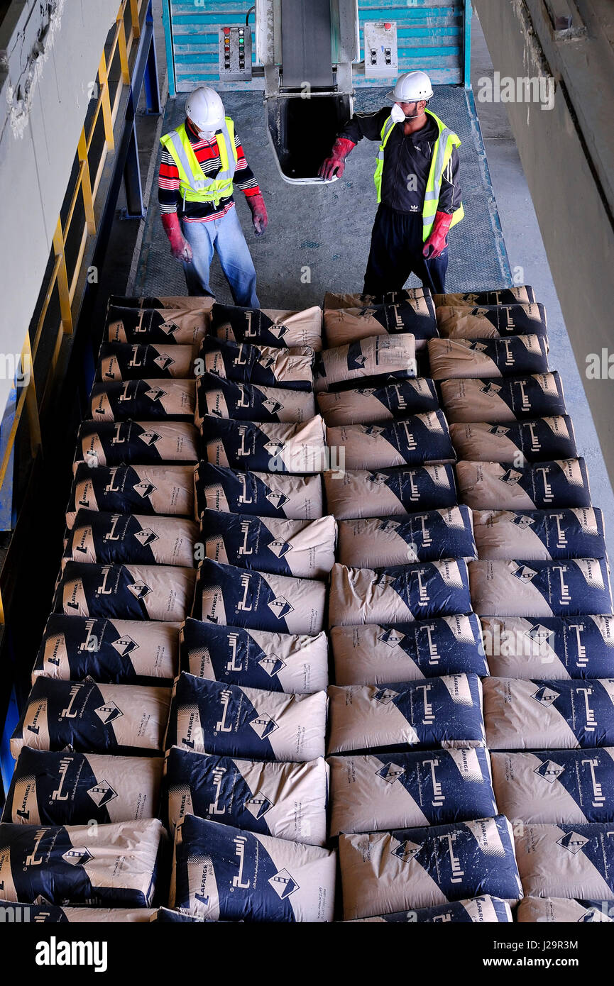 Syria, Lafarge cement factory, lifting of bags of cement destined to