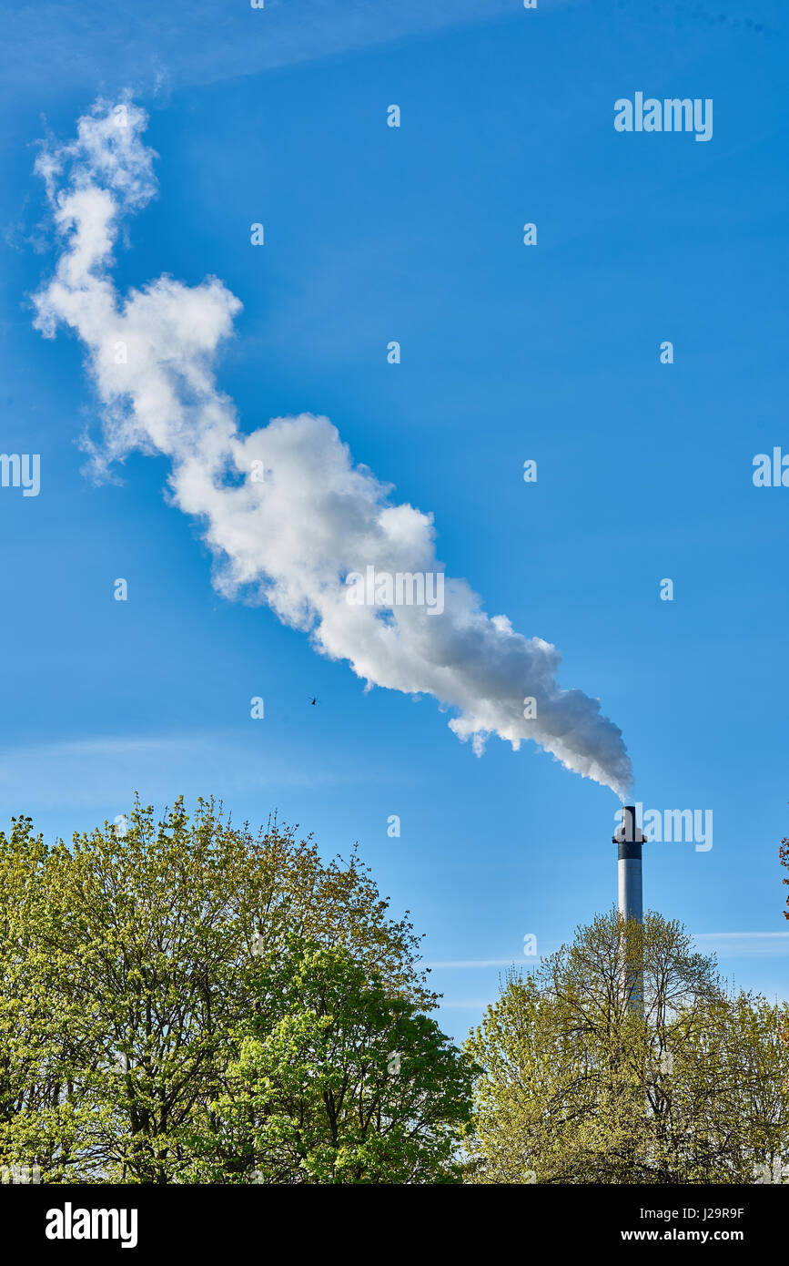 Smoky chimney Stock Photo