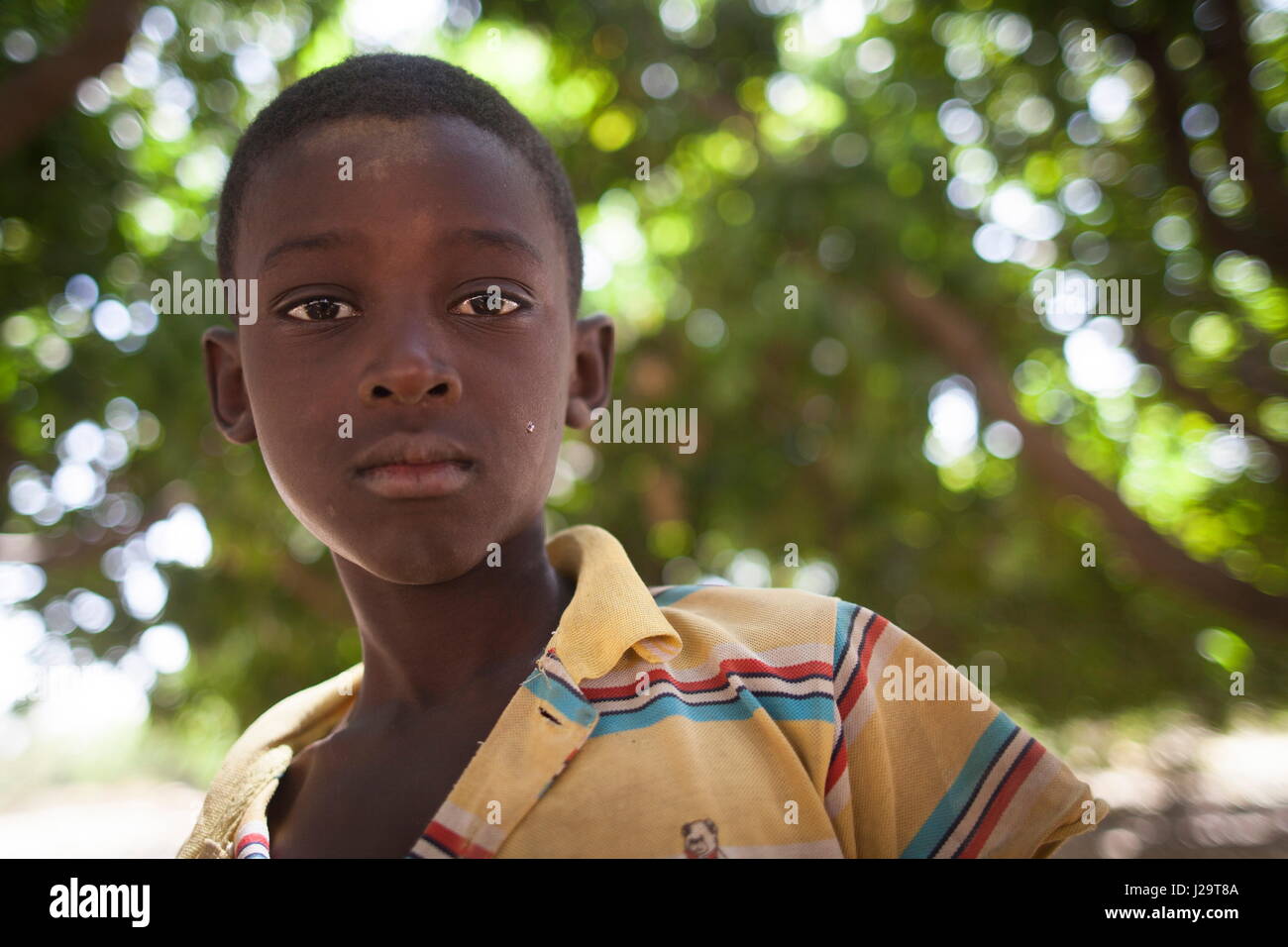 Burkina Faso, Portrait of a 10 years-old child herding cows in the village of Ponsom Tenga located 20 kilometers from Ouagadougou Stock Photo