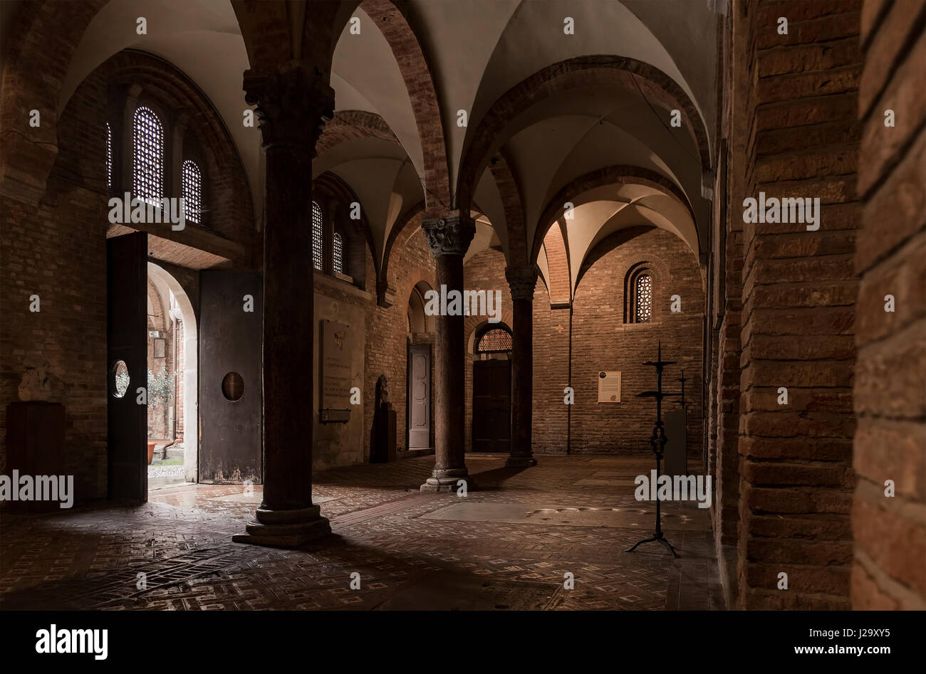 BOLOGNA, ITALY - FEBRUARY 06, 2017. Columns and vaulted ceilings inside the church of Santo Stefano. (some noise) Stock Photo