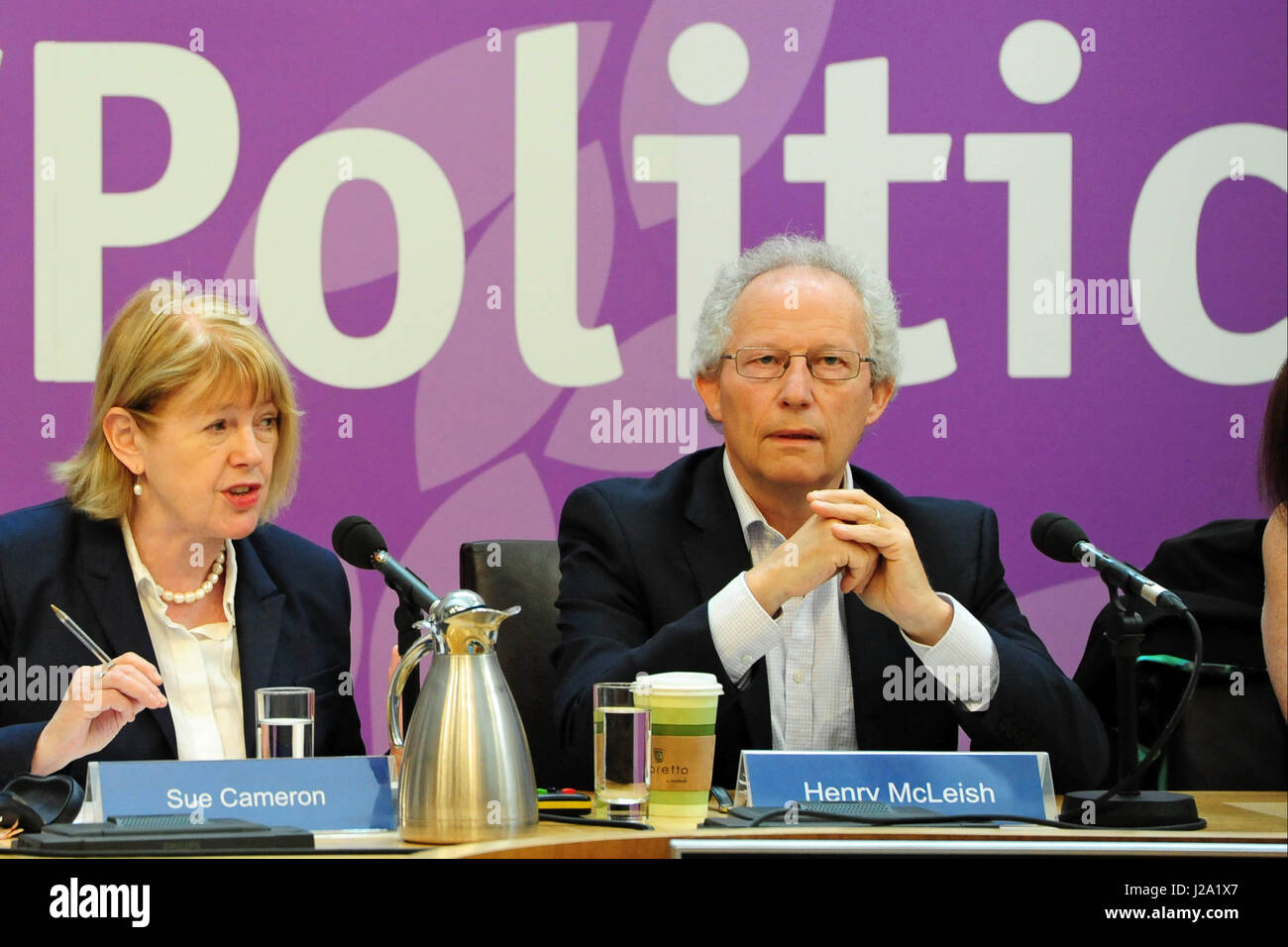 Former Scottish First Minister Henry McLeish (R) tells the audience at
