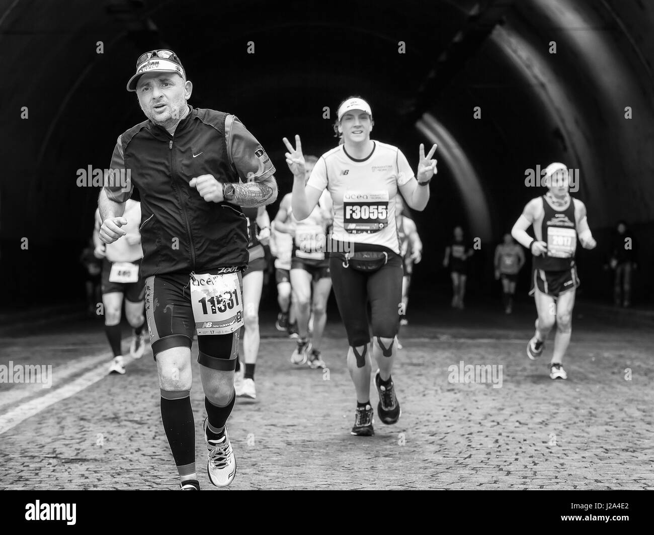 Rome, Italy - April 2nd, 2017: Athletes of the 23rd Rome Marathon to the passage of the tunnel Umberto I, a few kilometers from the finish. Stock Photo