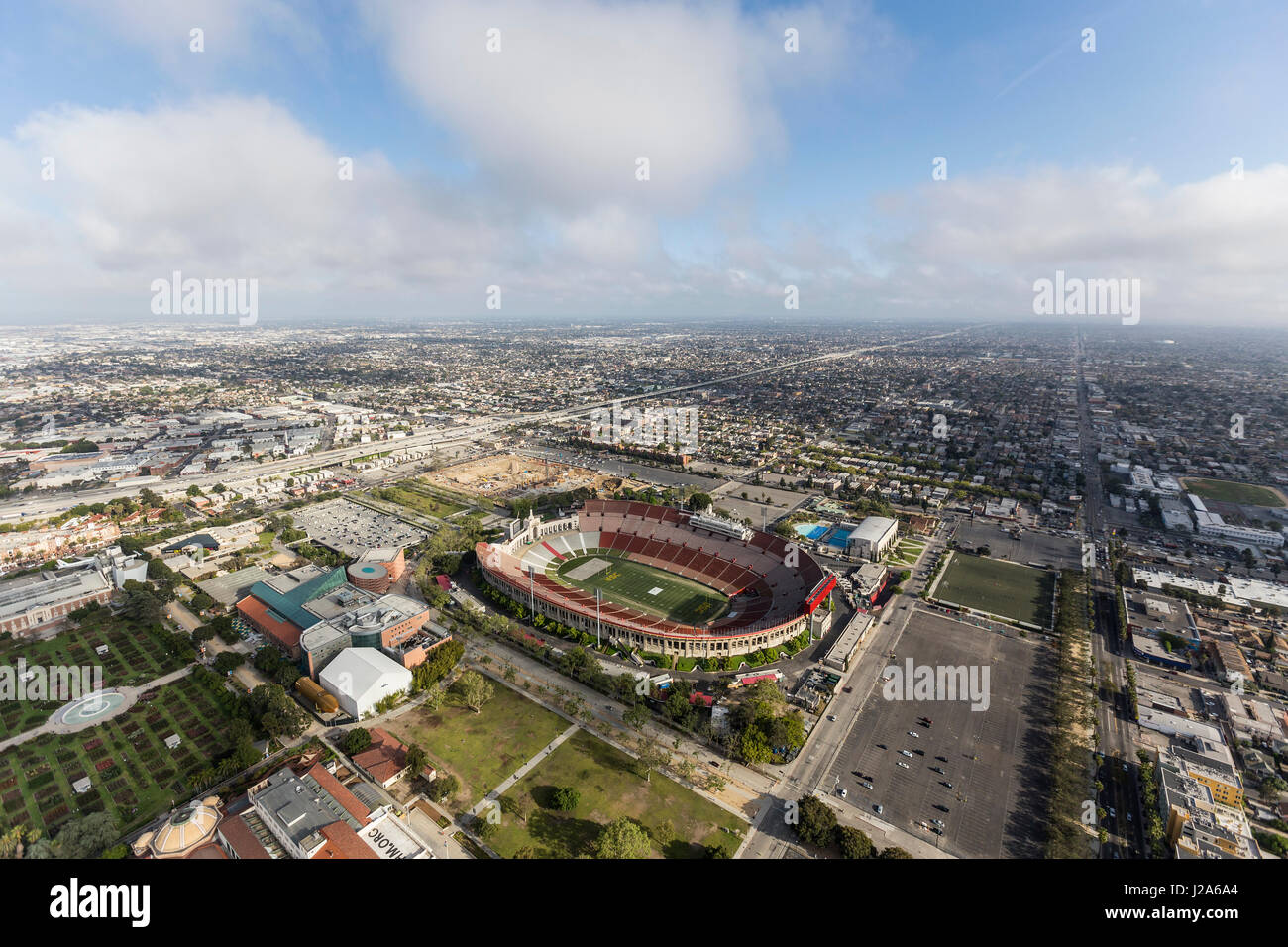 Los Angeles, California, USA - April 12, 2017:  Aerial view of the historic Coliseum with afternoon clouds. Stock Photo