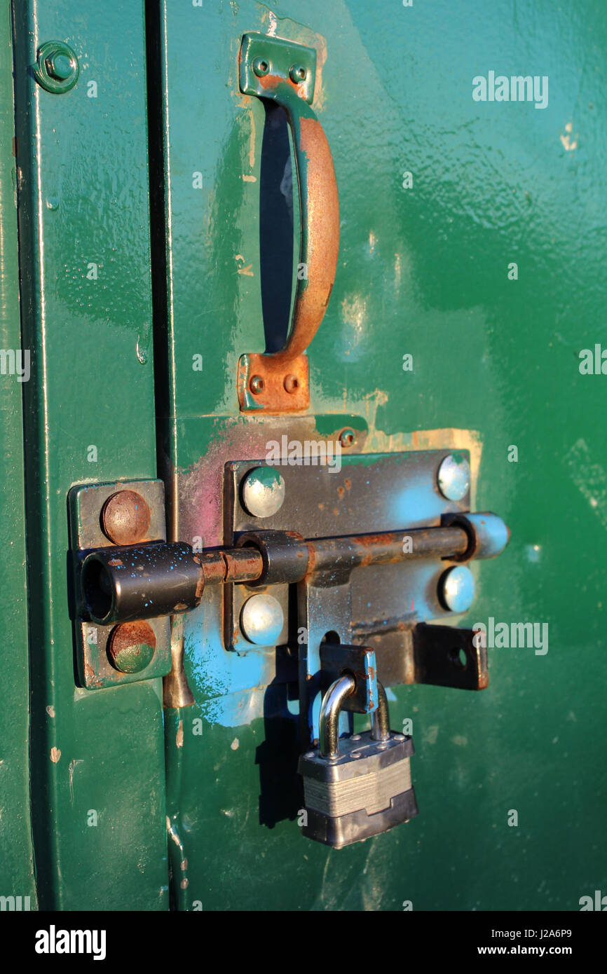 Closeup of a Colorful Bolt Lock on a Shed. Stock Photo
