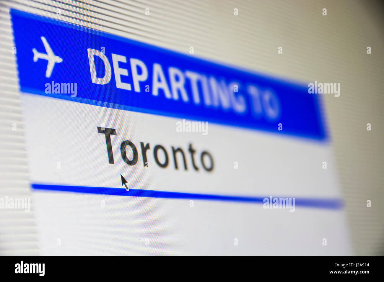 Computer screen close-up of status of flight departing to Toronto, Canada Stock Photo