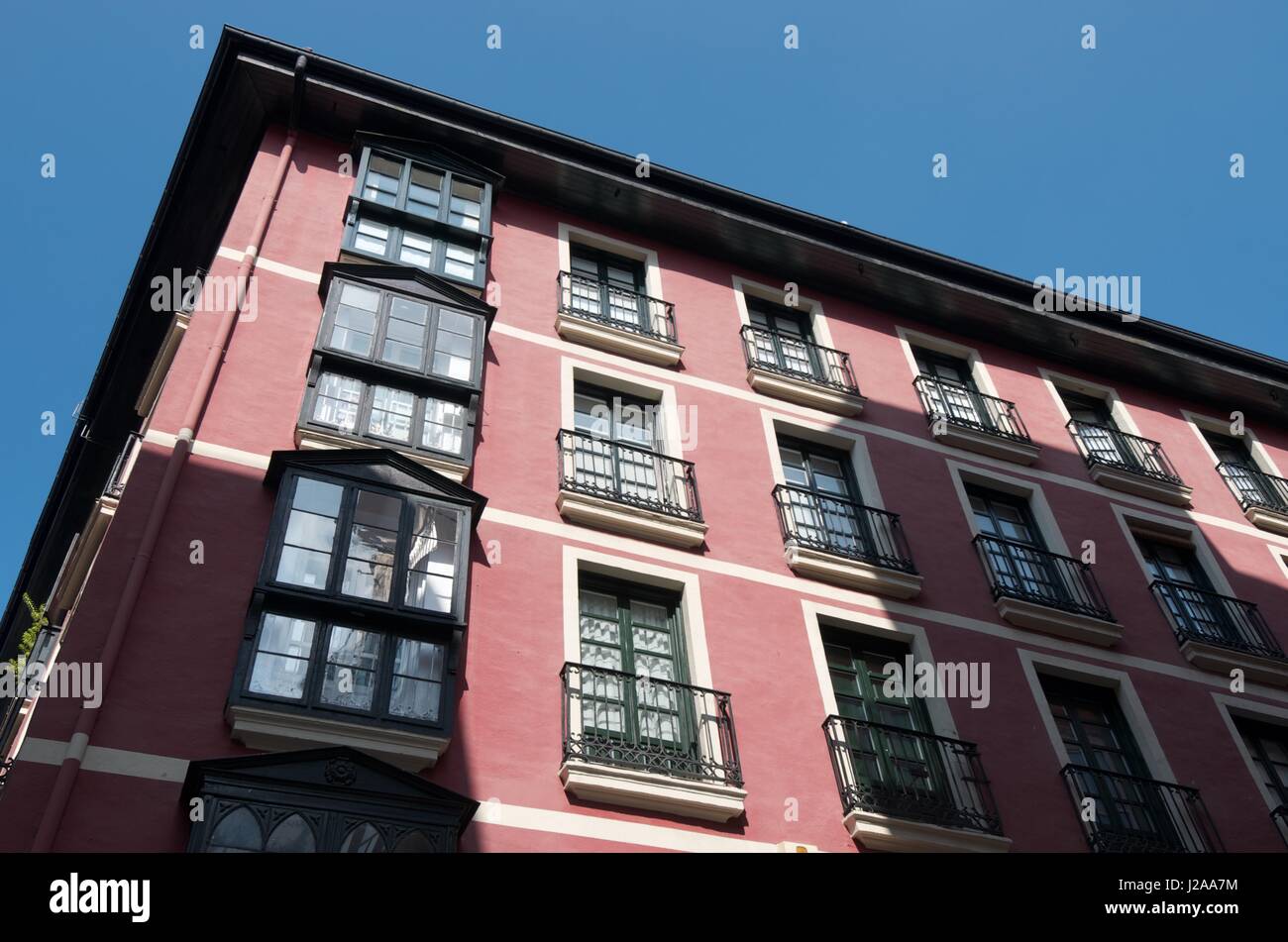 view of the facade of one of the typical buildings of the old town of ...