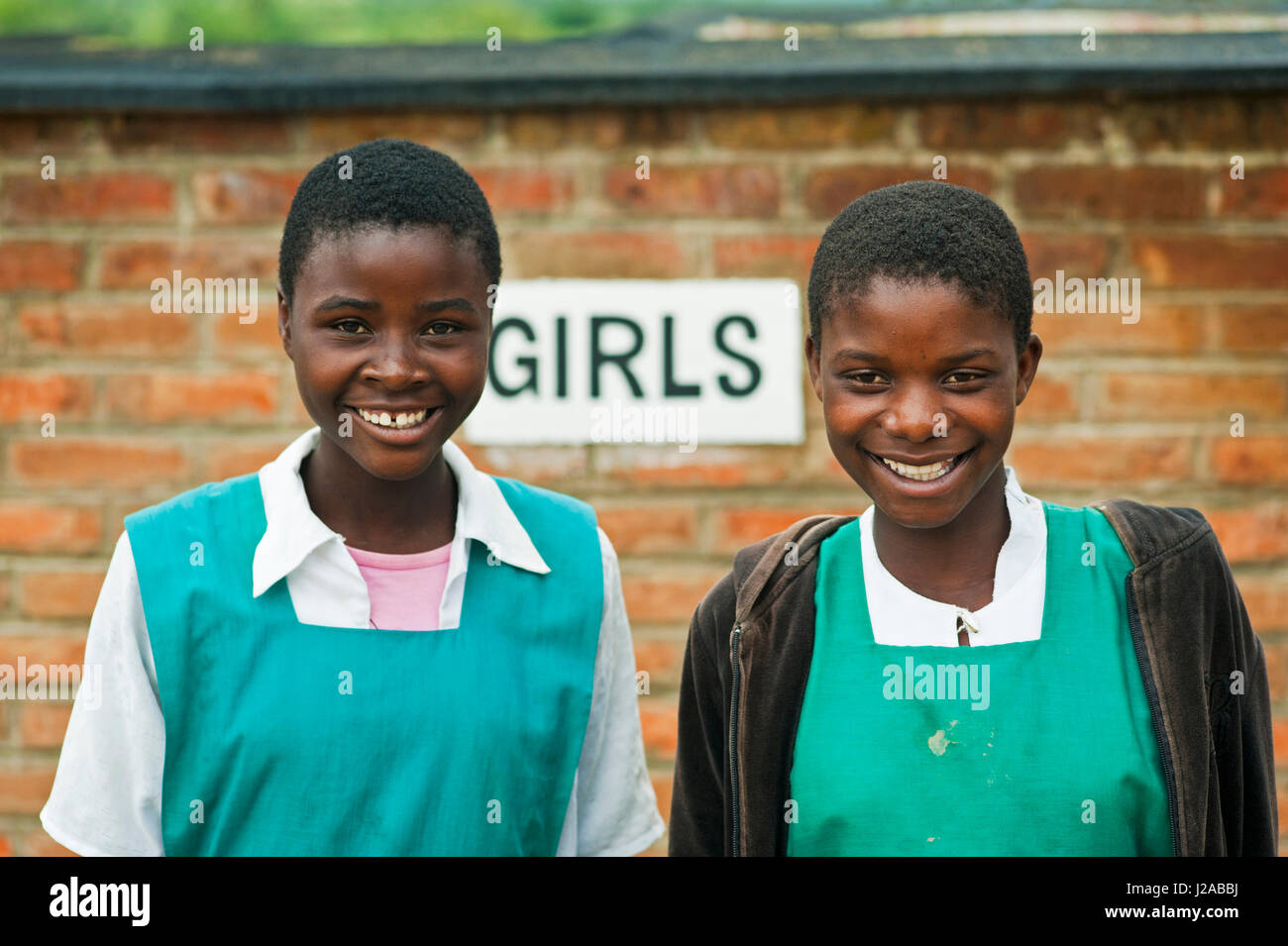 Malawi, Mzimba district, Thundwe Primary School, Twelve year old Alice Mwale and 13 year old Phoebe Lukhere at Thundwe Junior Primary School. The sanitary and hand washing facilities were provided by UNICEF. Stock Photo