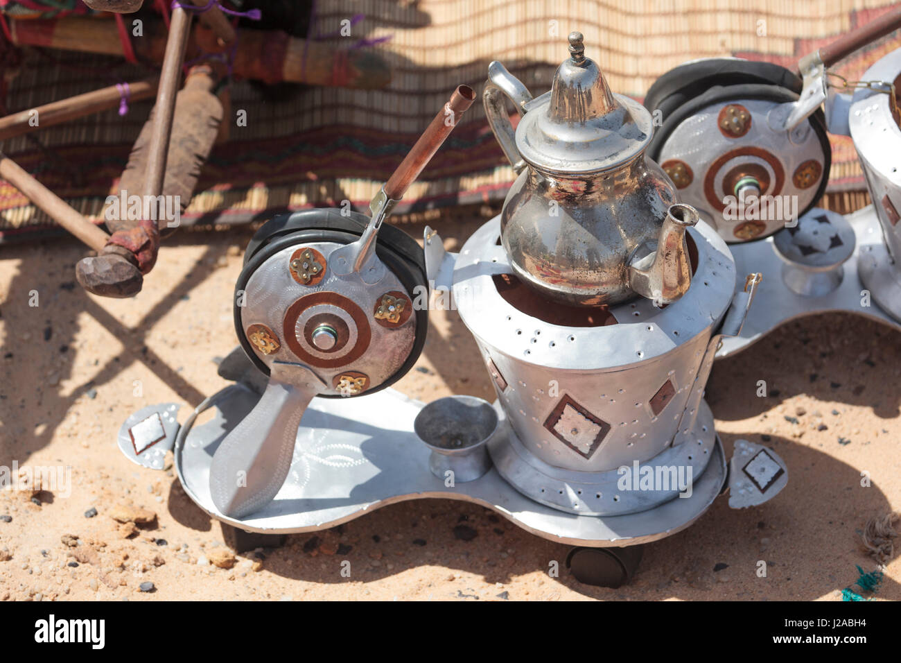 Africa, Western Sahara, Dakhla. An integrated kettle and boiler, sitting in the sand between uses. Stock Photo