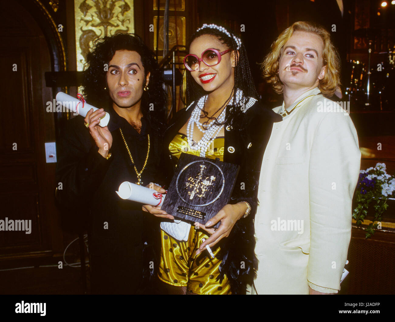 ARMY OF LOVERS with Jean-Pierre Barda, Camilla Henemark and Alexander Bard  with a Grammis Swedish music industry prize to best group 1990 Stock Photo  - Alamy