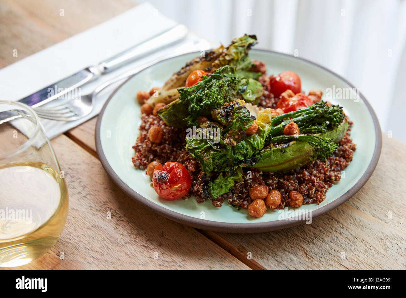 Avocado, broccolini, chickpea, quinoa salad, elevated view Stock Photo