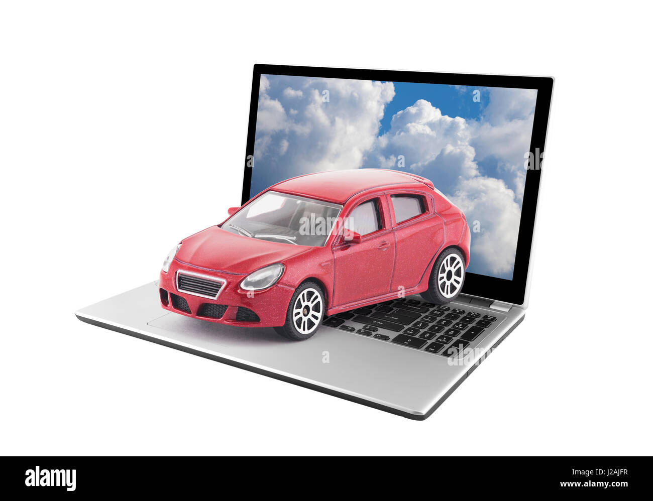 Toy car on laptop isolated on white background Stock Photo