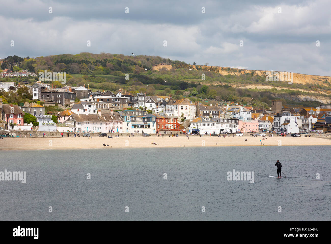 Lyme Regis Beach and Lyme Regis town seen from the sea, Lyme Regis, Dorset UK Stock Photo