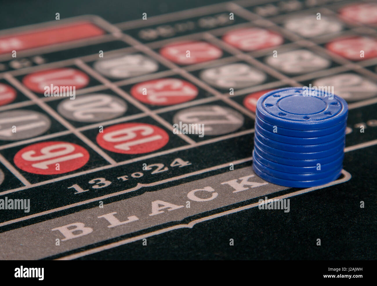 Casino table with roulette and chips Stock Photo - Alamy