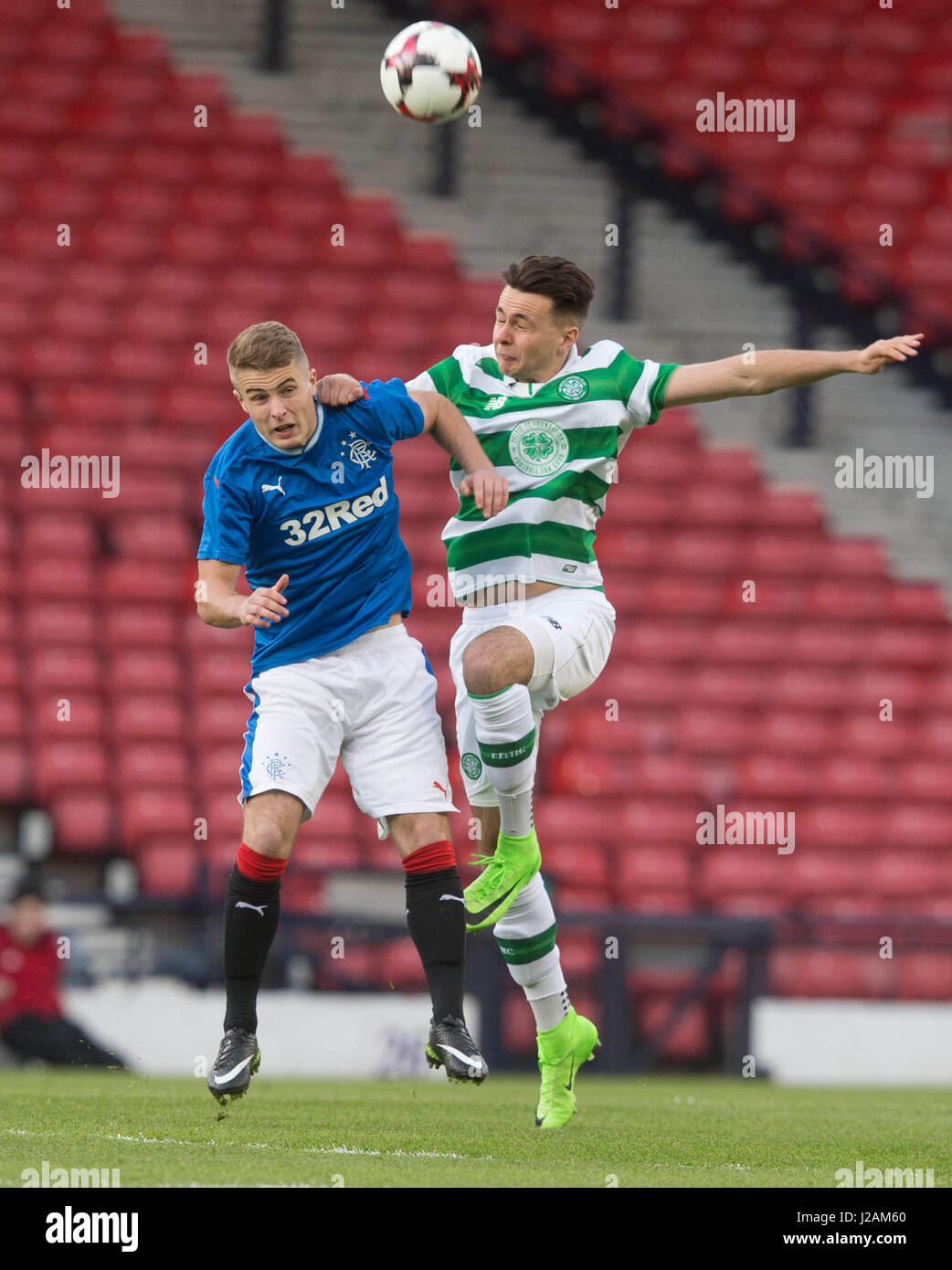Rangers' Andrew Dallas (left) and Celtic's Josh Kerr battle for the ball during the Scottish FA Youth Cup Final at Hampden Park, Glasgow. Stock Photo