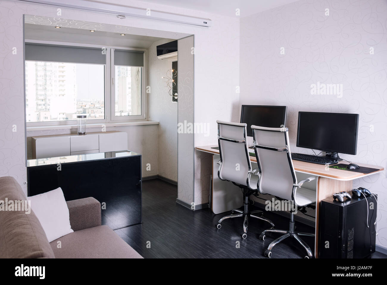 Interior of modern apartment with workplace Stock Photo