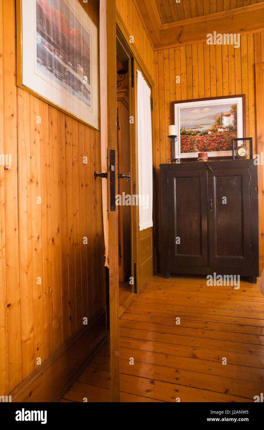 Old Wooden Antique Armoire In The Corner Of A Guest Bedroom