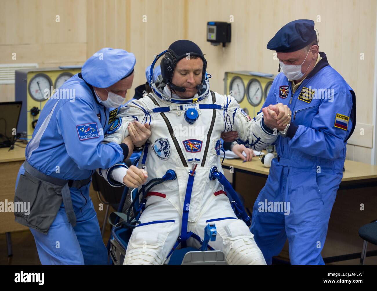 NASA International Space Station Expedition 51 prime crew member American astronaut Jack Fischer has his Russian Sokol launch and entry spacesuit pressure-checked in preparation for the Soyuz MS-04 launch at the Baikonur Cosmodrome April 20, 2017 in Baikonur, Kazakhstan.     (photo by Aubrey Gemignani /NASA  via Planetpix) Stock Photo