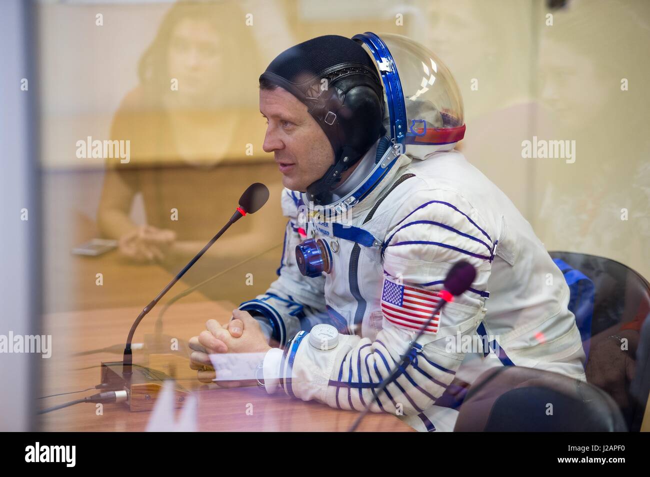 NASA International Space Station Expedition 51 prime crew member American astronaut Jack Fischer speaks with his family after having his Russian Sokol launch and entry spacesuit pressure-checked in preparation for the Soyuz MS-04 launch at the Baikonur Cosmodrome April 20, 2017 in Baikonur, Kazakhstan.     (photo by Aubrey Gemignani /NASA  via Planetpix) Stock Photo