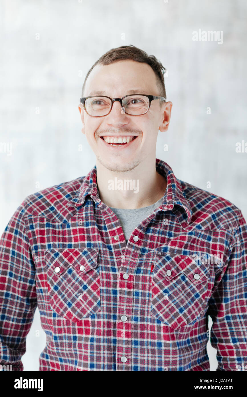 Portrait of happy young man isolated over white background Stock Photo ...