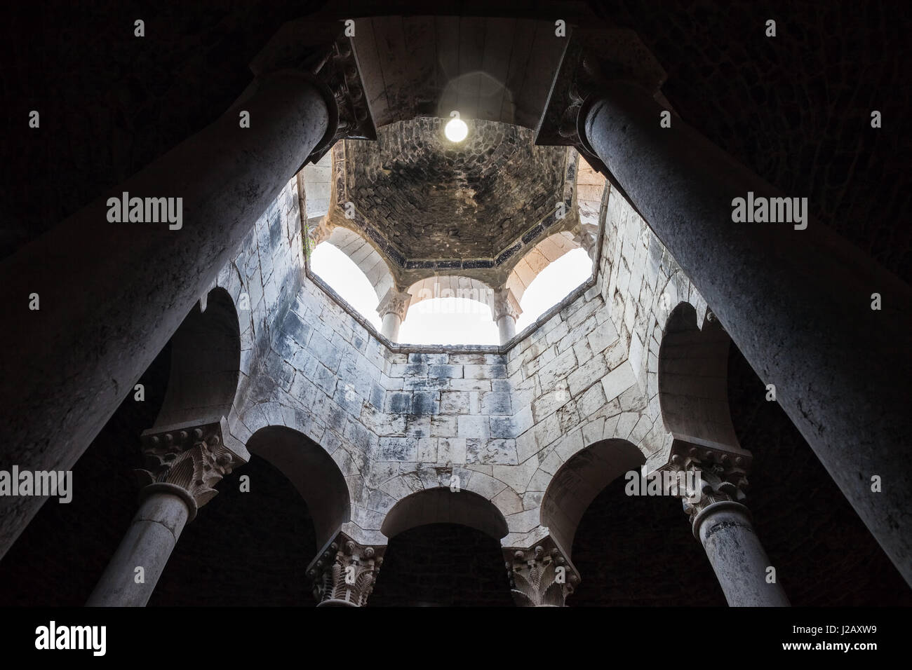 Arab Baths interior in Girona, Catalonia, Spain, daylighting cupola in Apodyterium room, Romanesque architecture Stock Photo