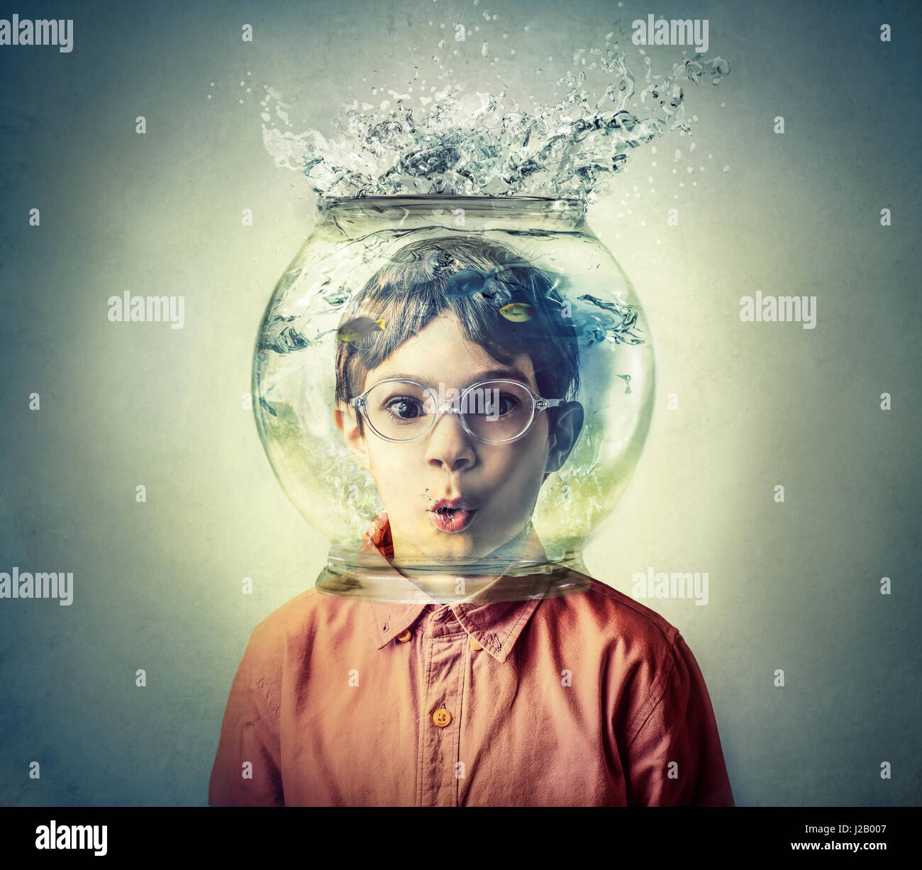 Young boy's head in aquarium Stock Photo Alamy