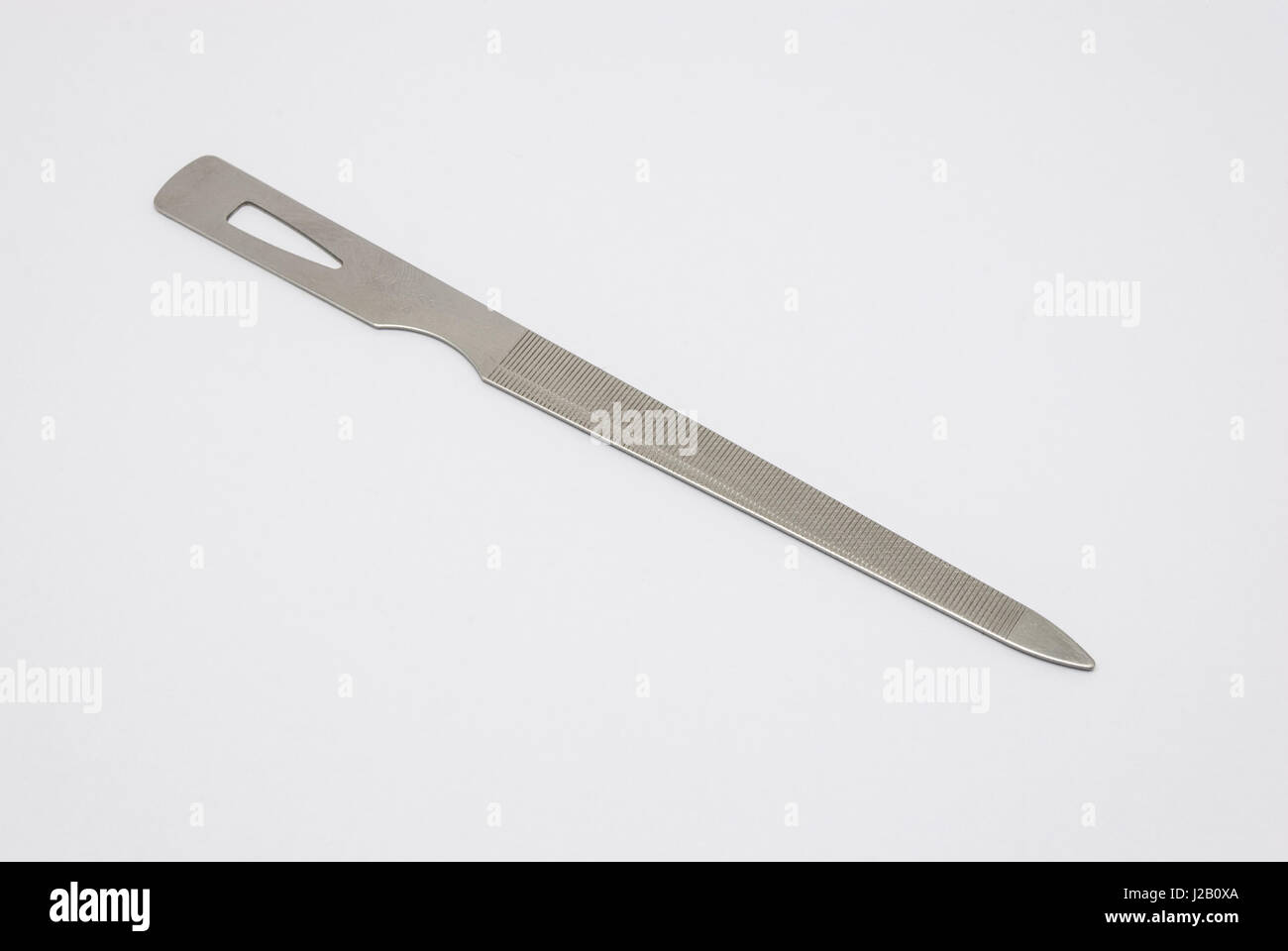 Closeup to Old Stainless Nail Files in Good Condition, Isolated Stock