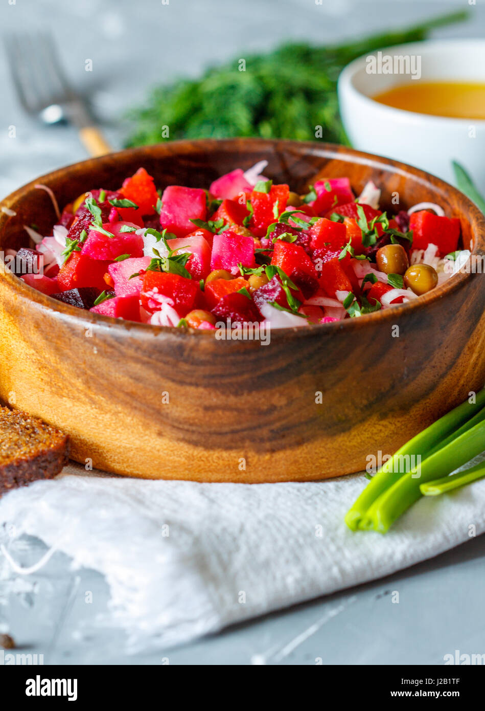 Russian Ukrainian traditional beetroot salad vinaigrette with bread