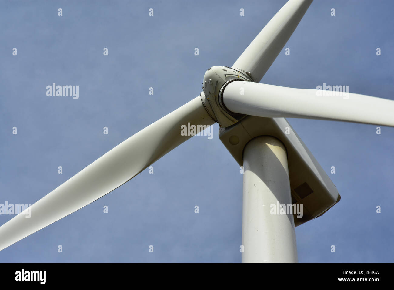 Close up of wind turbine generator and blades. Stock Photo