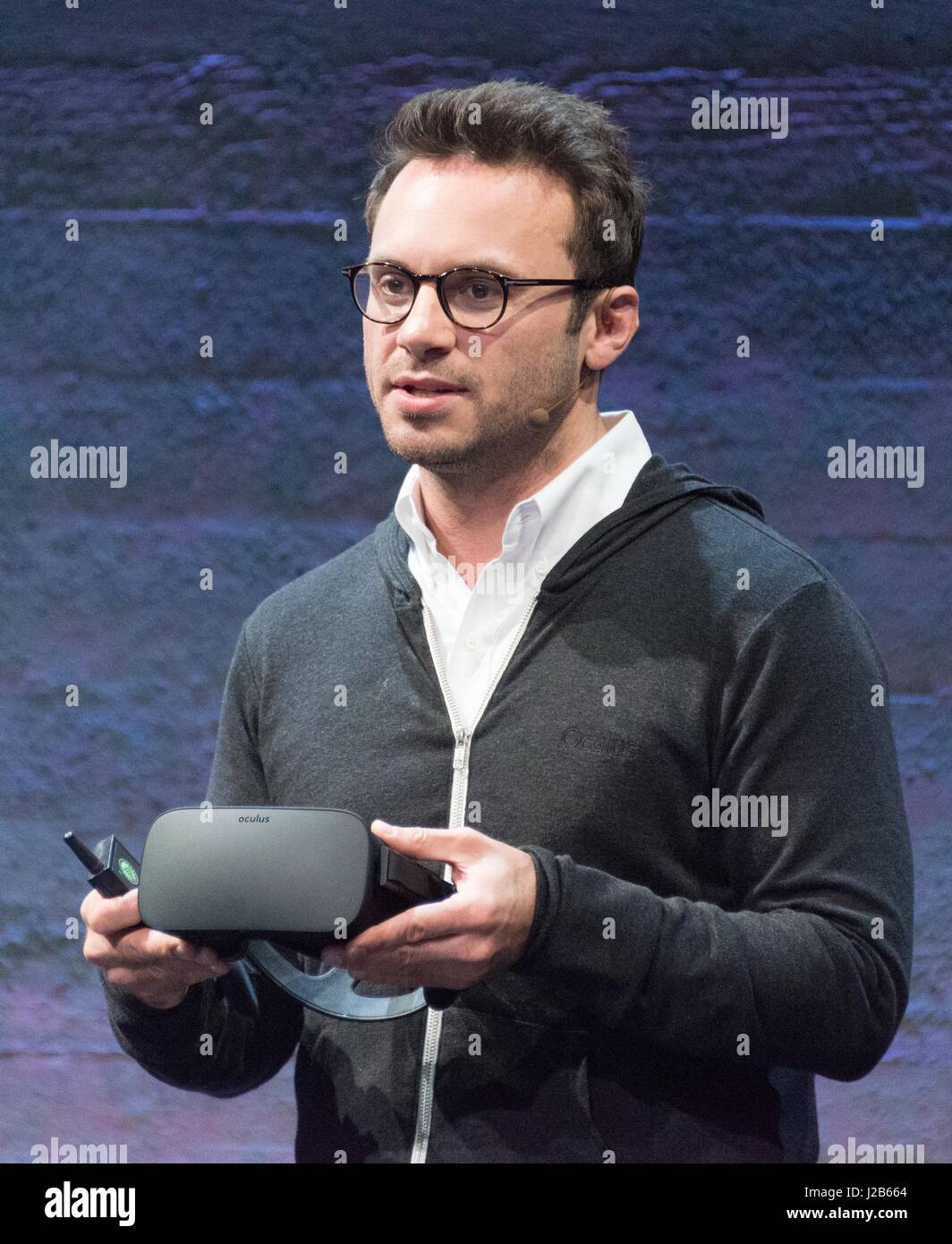 Oculus CEO Brendan Iribe holds the Oculus Rift consumer version Virtual