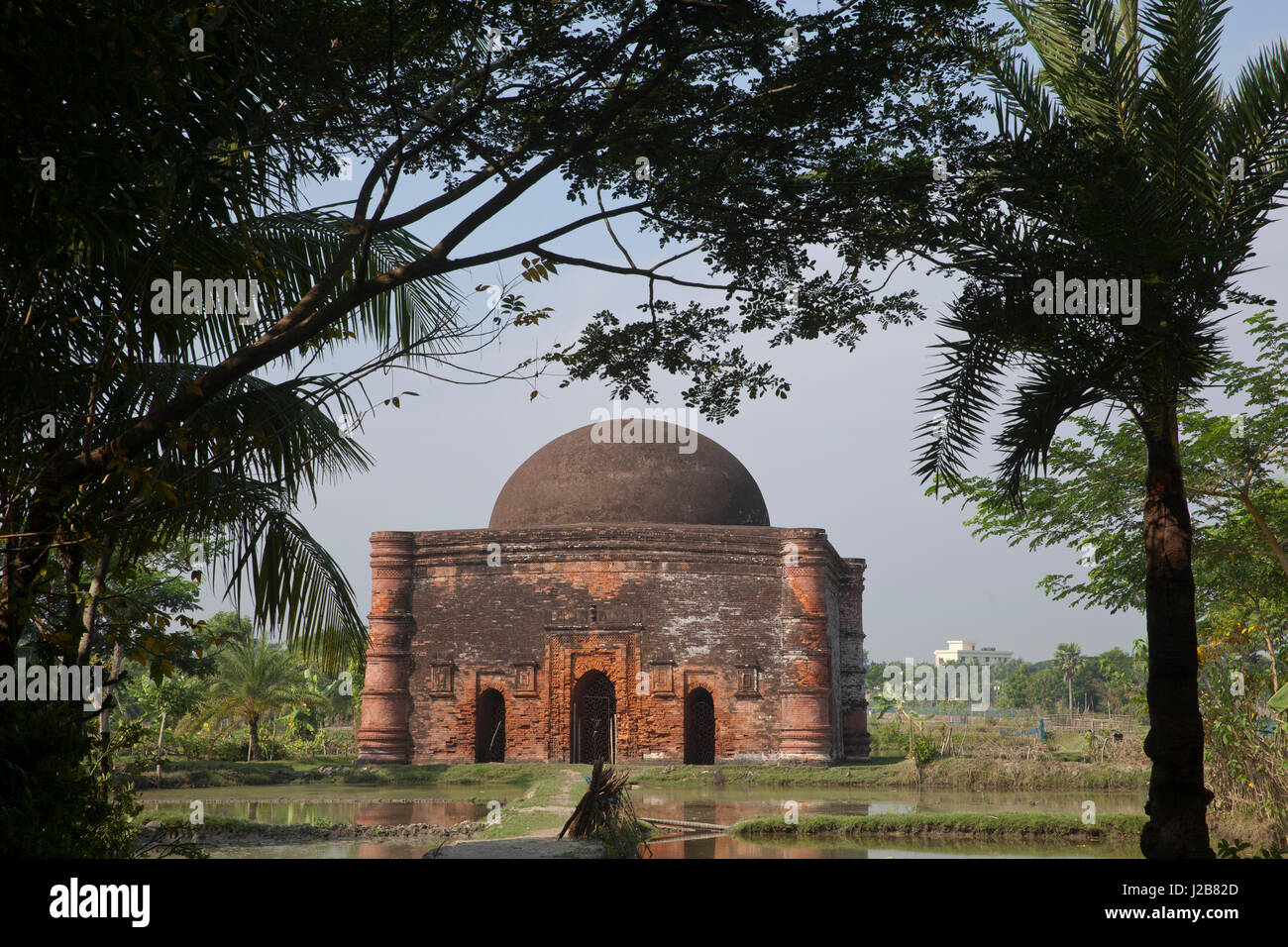 Chunakhola Mosque, located about a mile away to the northwest of the Sixty Dome Mosque at Bagerhat, derives its name from the name of the village Chun Stock Photo