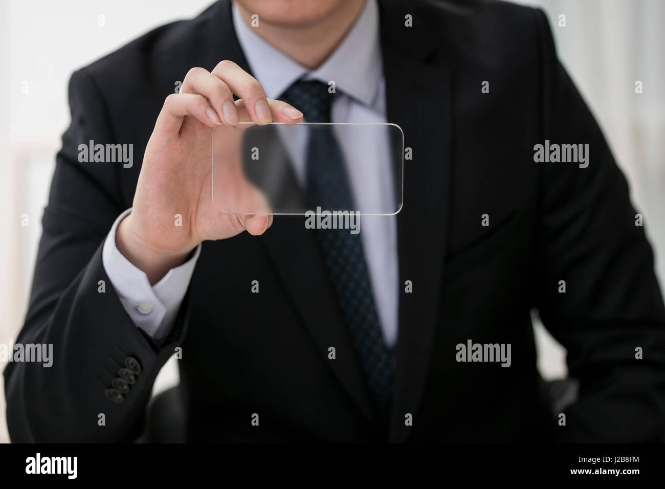 Businessman with screen Stock Photo - Alamy
