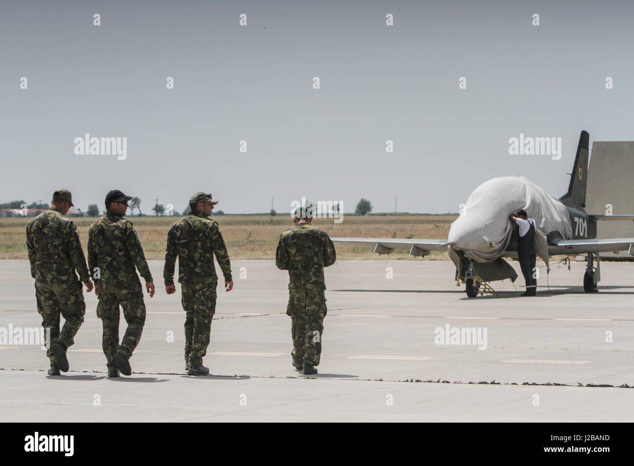 BUZAU, ROMANIA, June 18, 2016: Military on the airport track in the ...