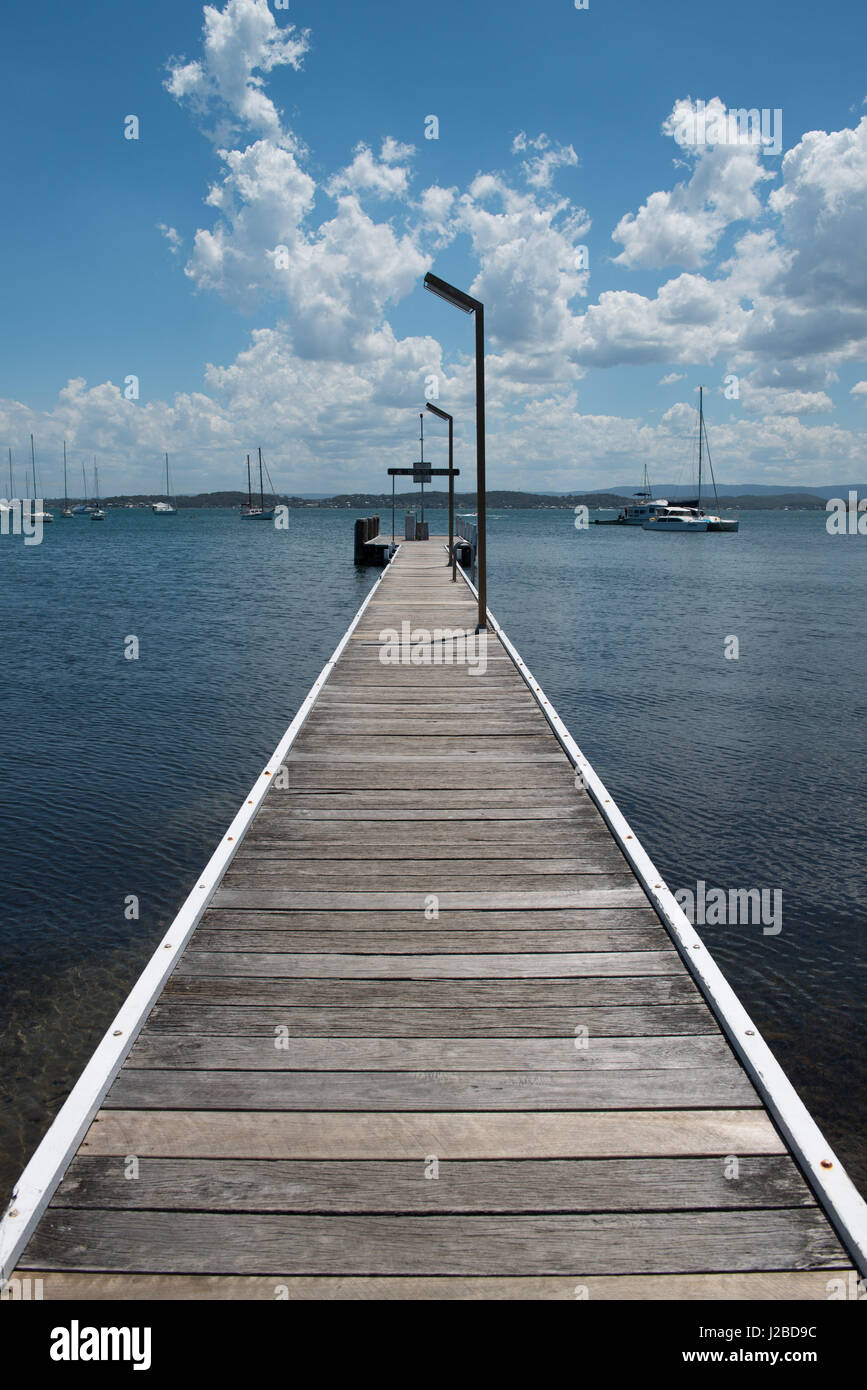 A jetty reaches out into the waters of Lake Macquarie at Belmont, NSW