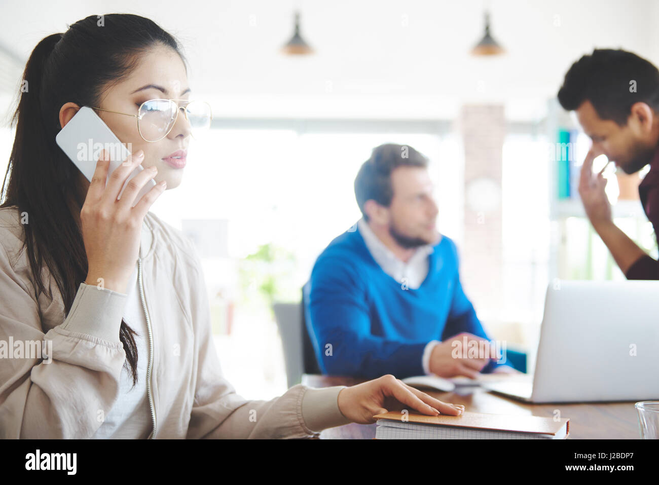 Female coworker contact with customers Stock Photo Alamy