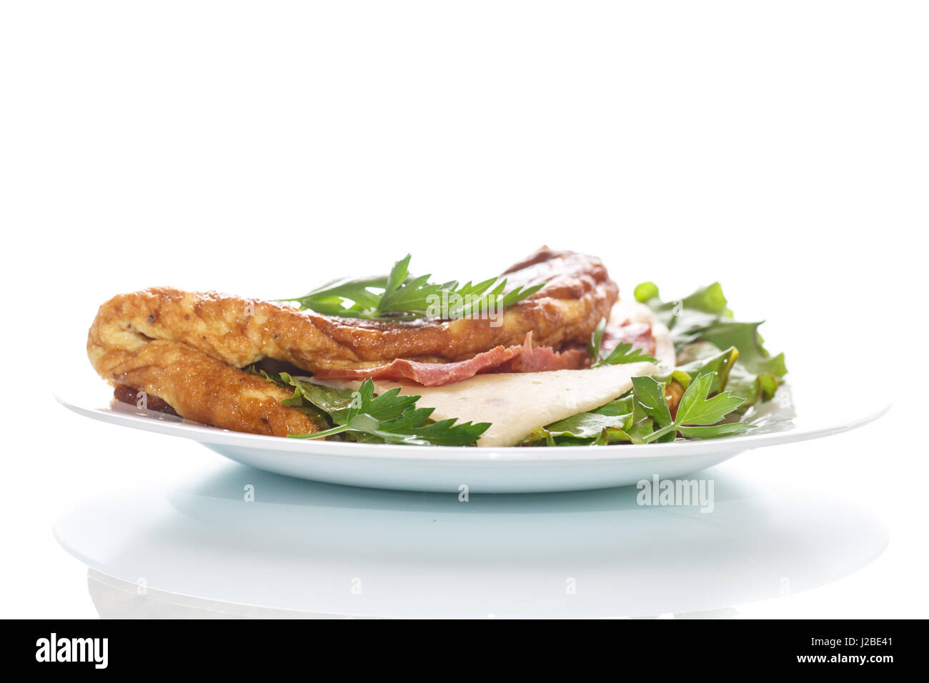scrambled eggs with fresh herbs Stock Photo - Alamy