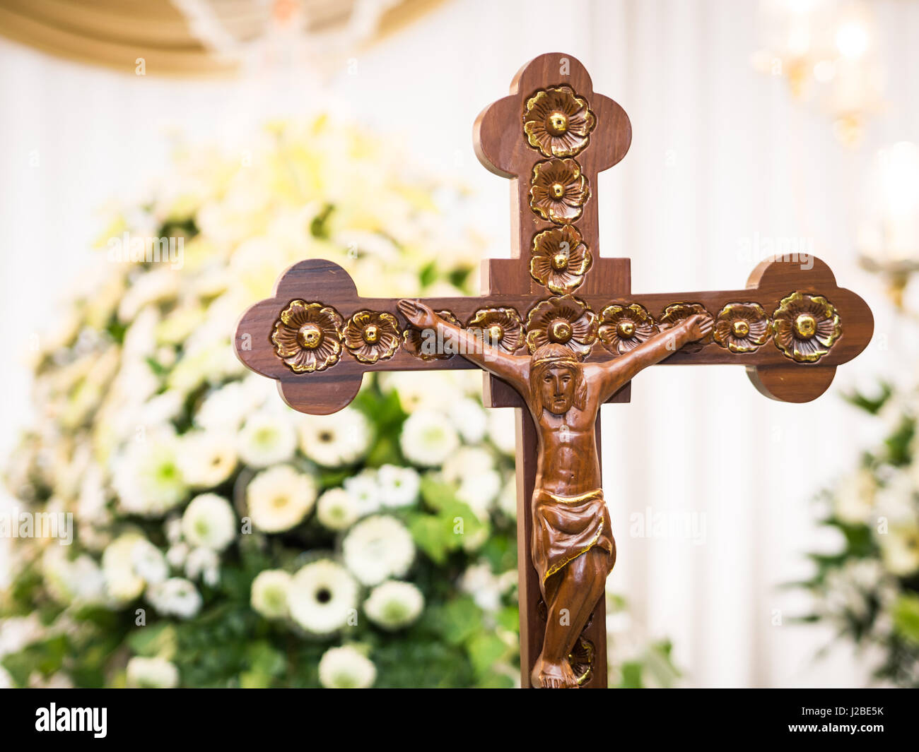 Wooden Jesus Christ On Cross With Flower