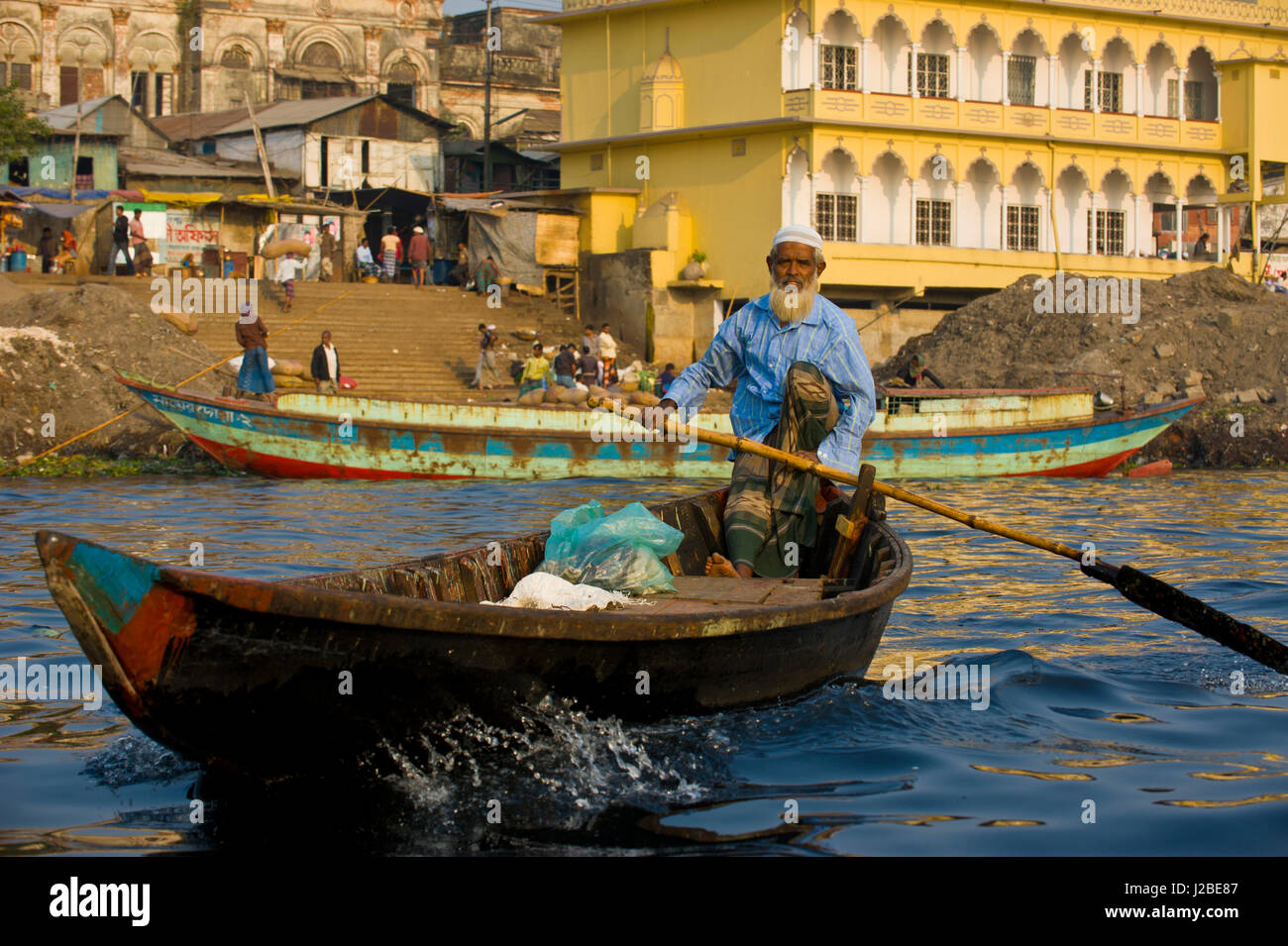 Rowboat in the busy harbor of Dhaka, Bangladesh, Asia Stock Photo