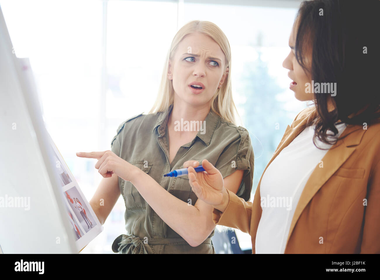 Business women struggling with failure Stock Photo