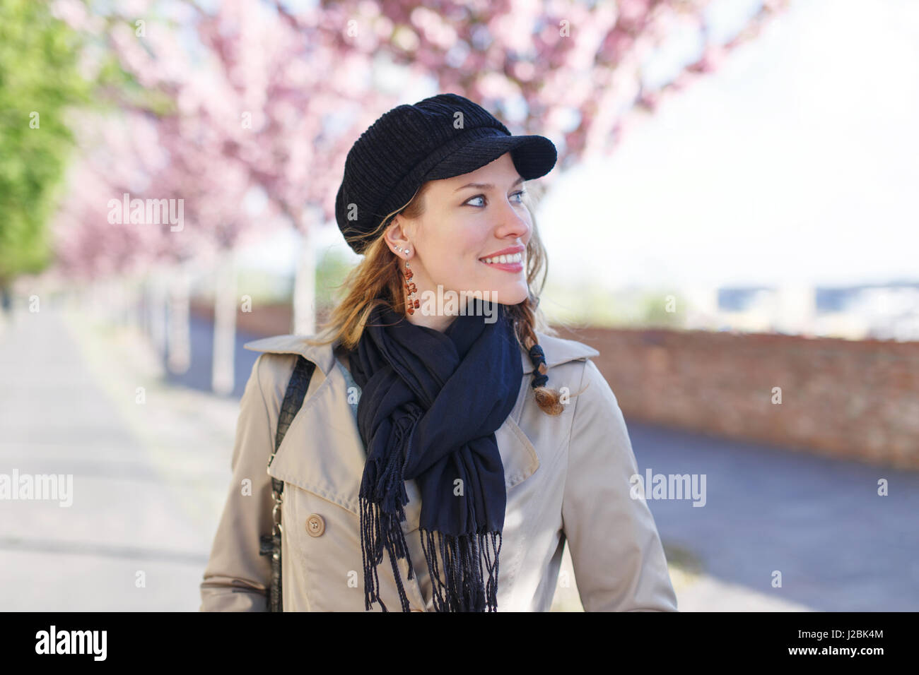 Young balanced caucasian natural woman walking in park at spring portrait Stock Photo