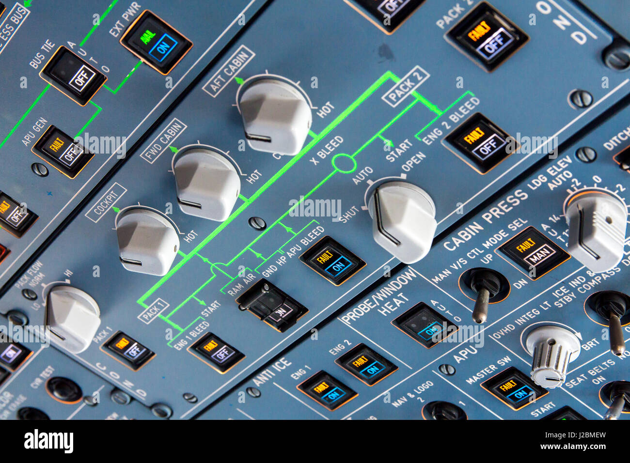 Airbus A320 overhead panel with switches and knobs for controlling various aircraft systems and components. Stock Photo