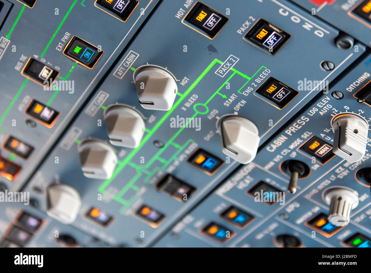 Airbus A320 overhead panel with switches and knobs for controlling various aircraft systems and components. Stock Photo