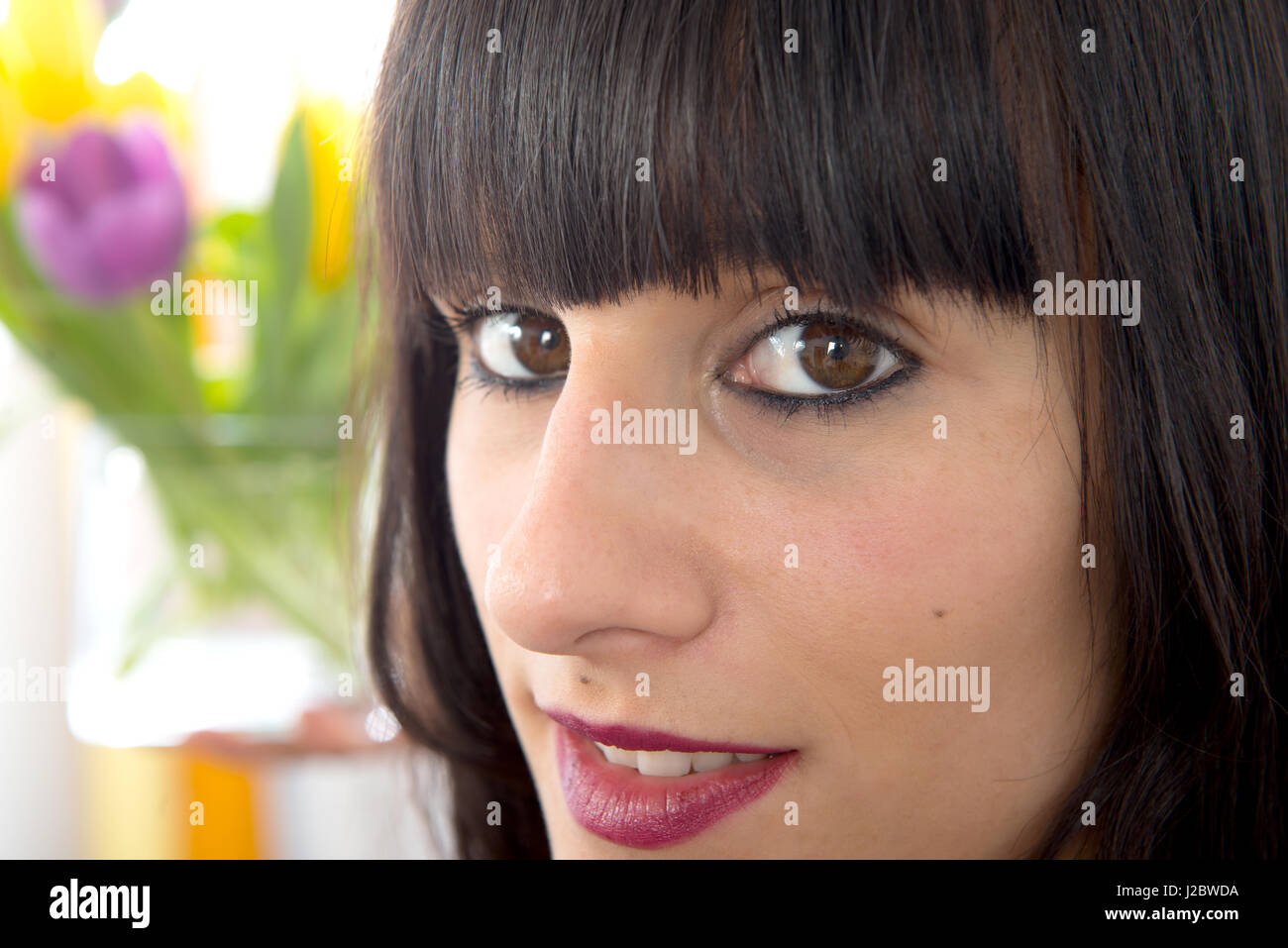 a portrait of beautiful young brunette girl Stock Photo - Alamy