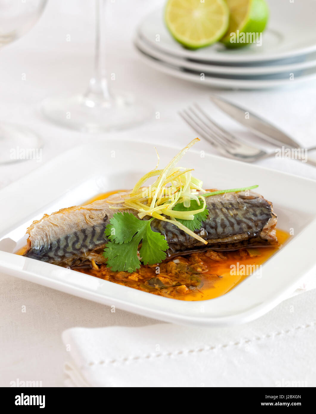 Pickled mackerel in a sauce on a plate Stock Photo Alamy