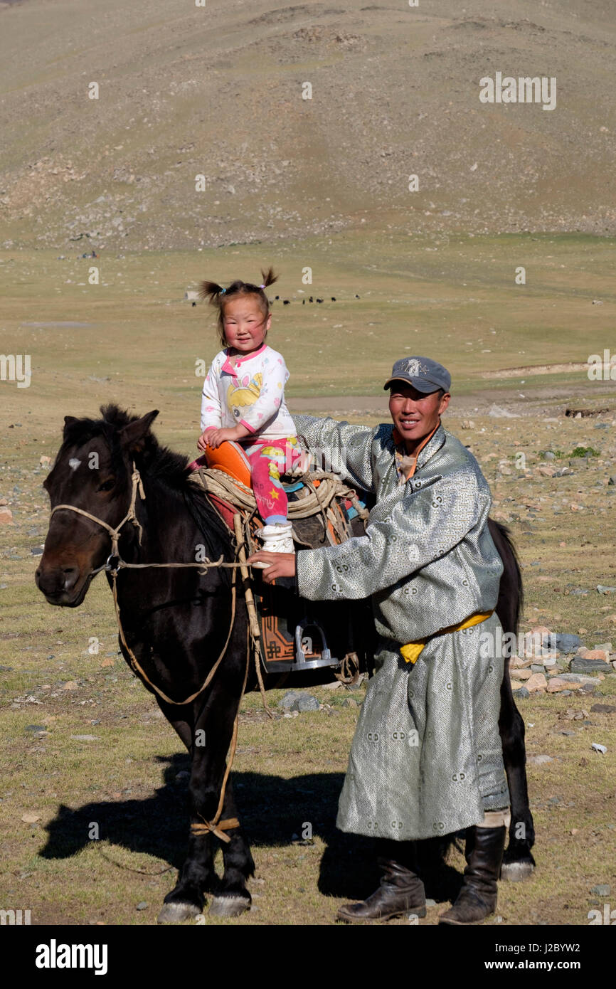 Asia, Mongolia, Altan Hokhii Mountains, Mongolian horse, father and