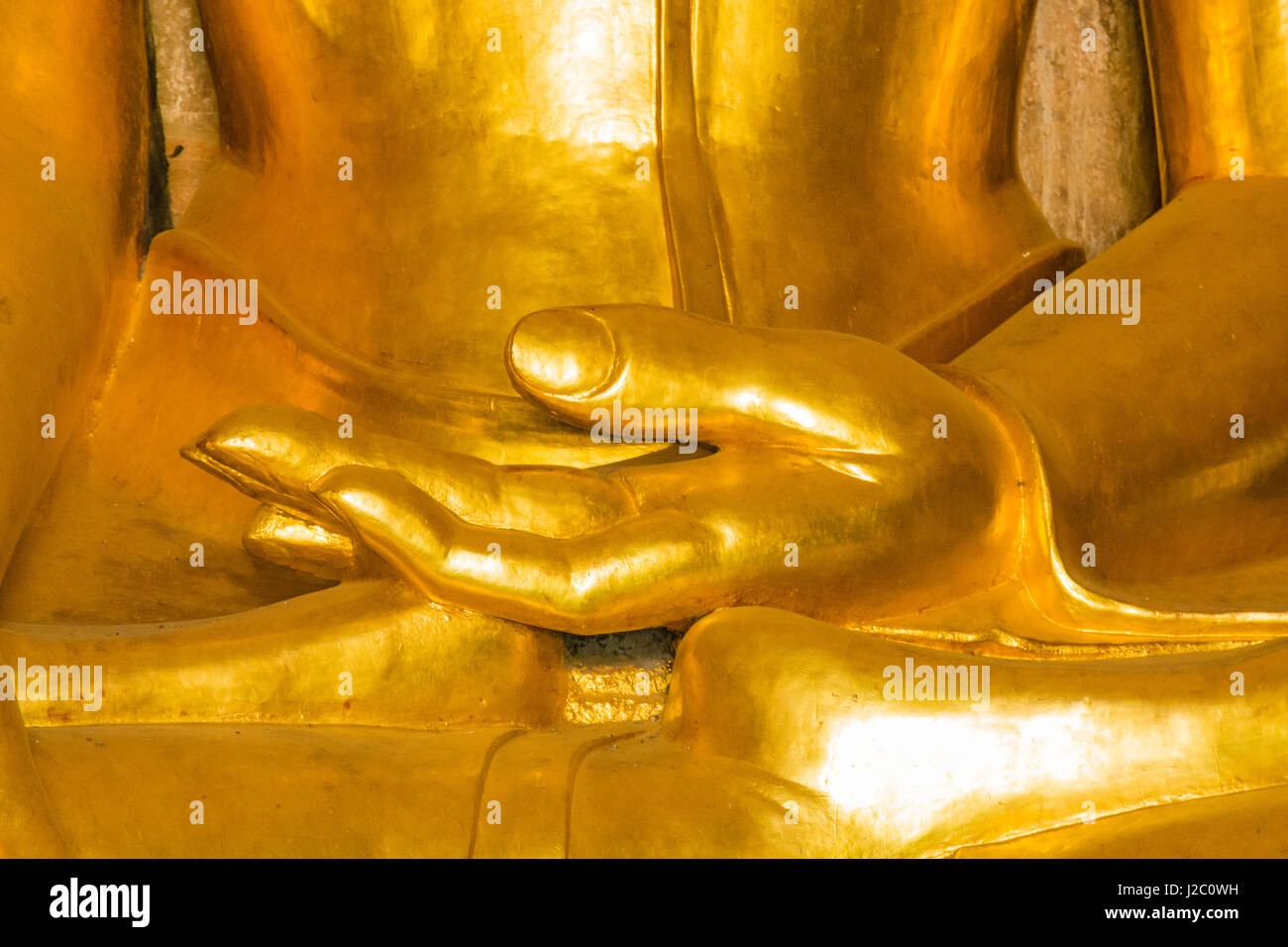 Myanmar. Bagan. Htilominlo Temple. Golden Buddha hand. Stock Photo