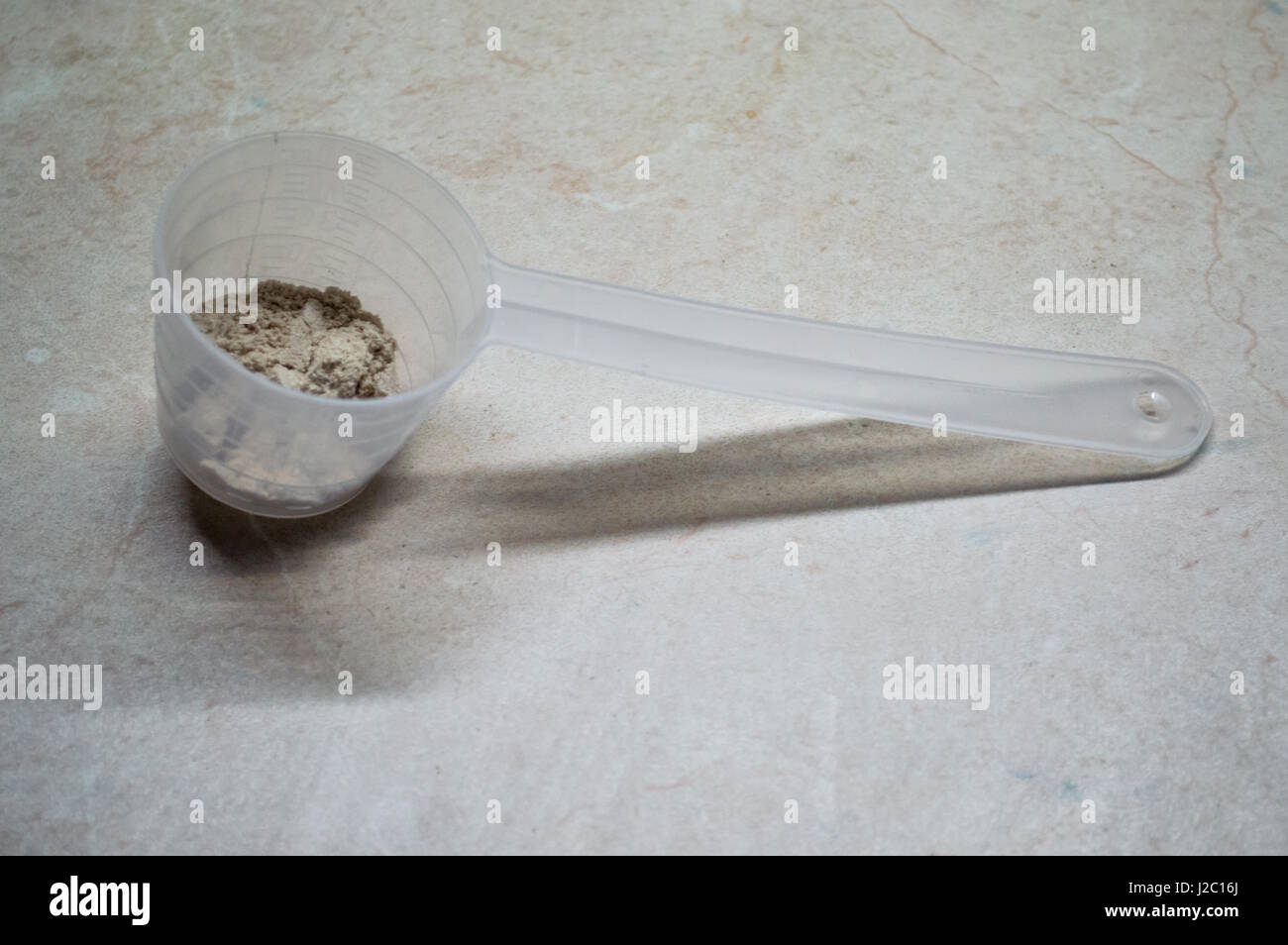 Whey Protein Scoop with Whey Protein Powder Stock Photo Alamy
